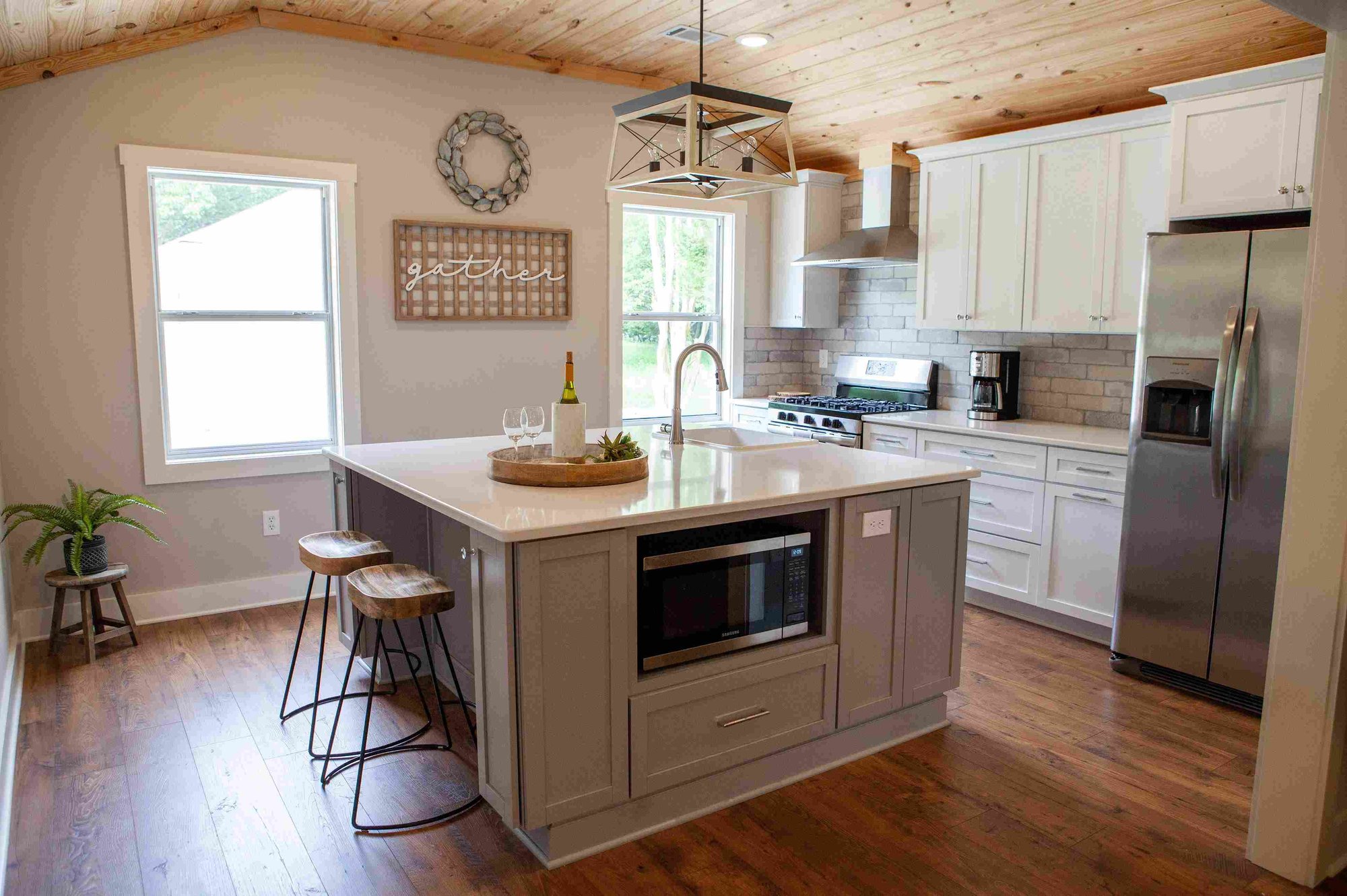 Kitchen Island and Wood Plank Ceiling in Remodeled Home _ PAXISgroup Custom Home Builders in GA_11zon Kitchen Island and Wood Plank Ceiling in Remodeled Home _ PAXISgroup Custom Home Builders in GA_11zon