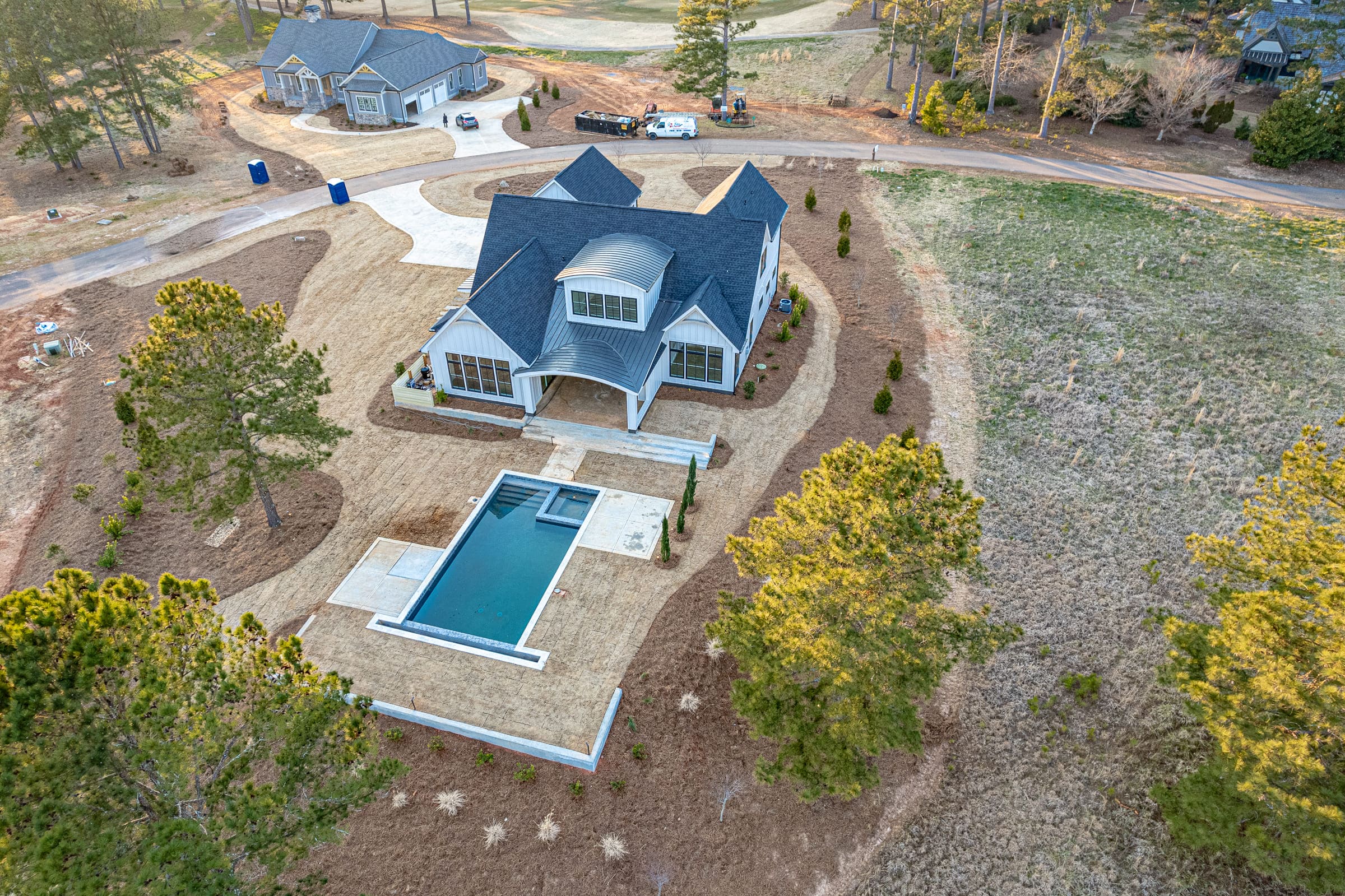 Birds Eye-View Shot of House and Built-in Pool |PAXISgroup