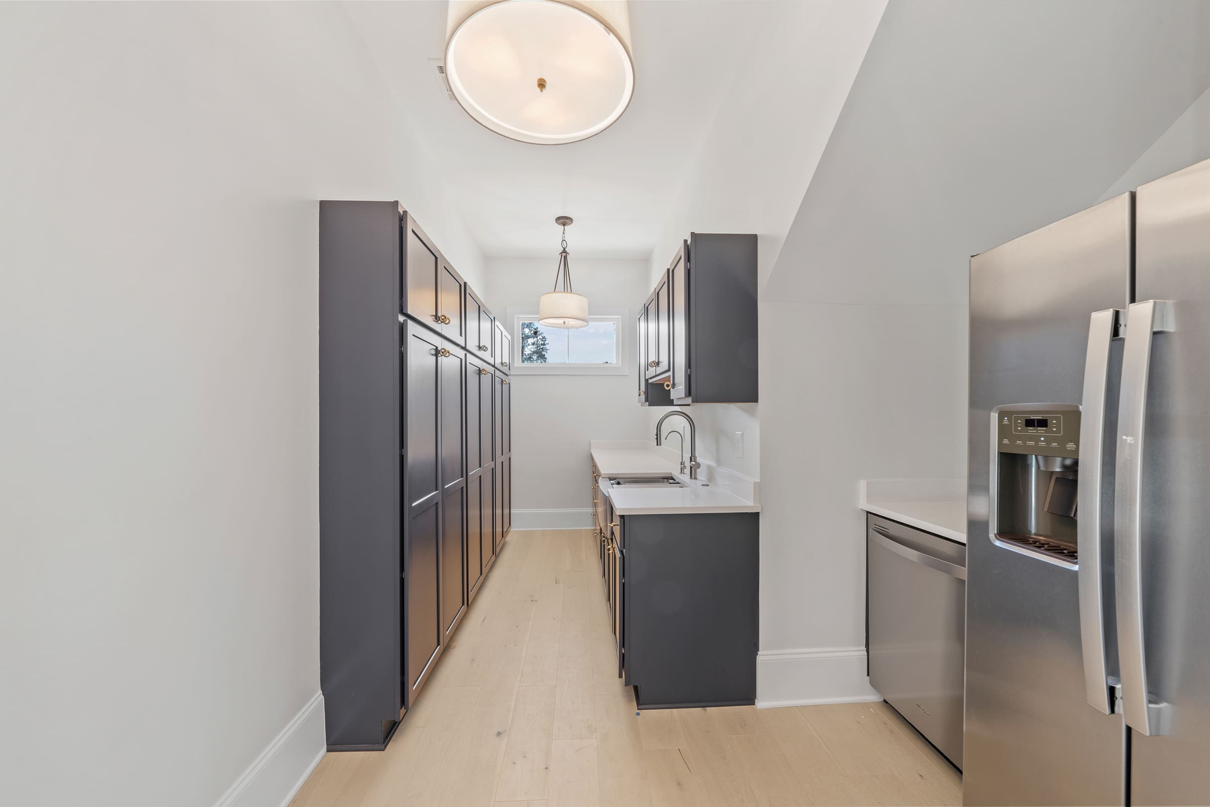 Walk-in Pantry with Dishwasher and Large Fridge |PAXISgroup