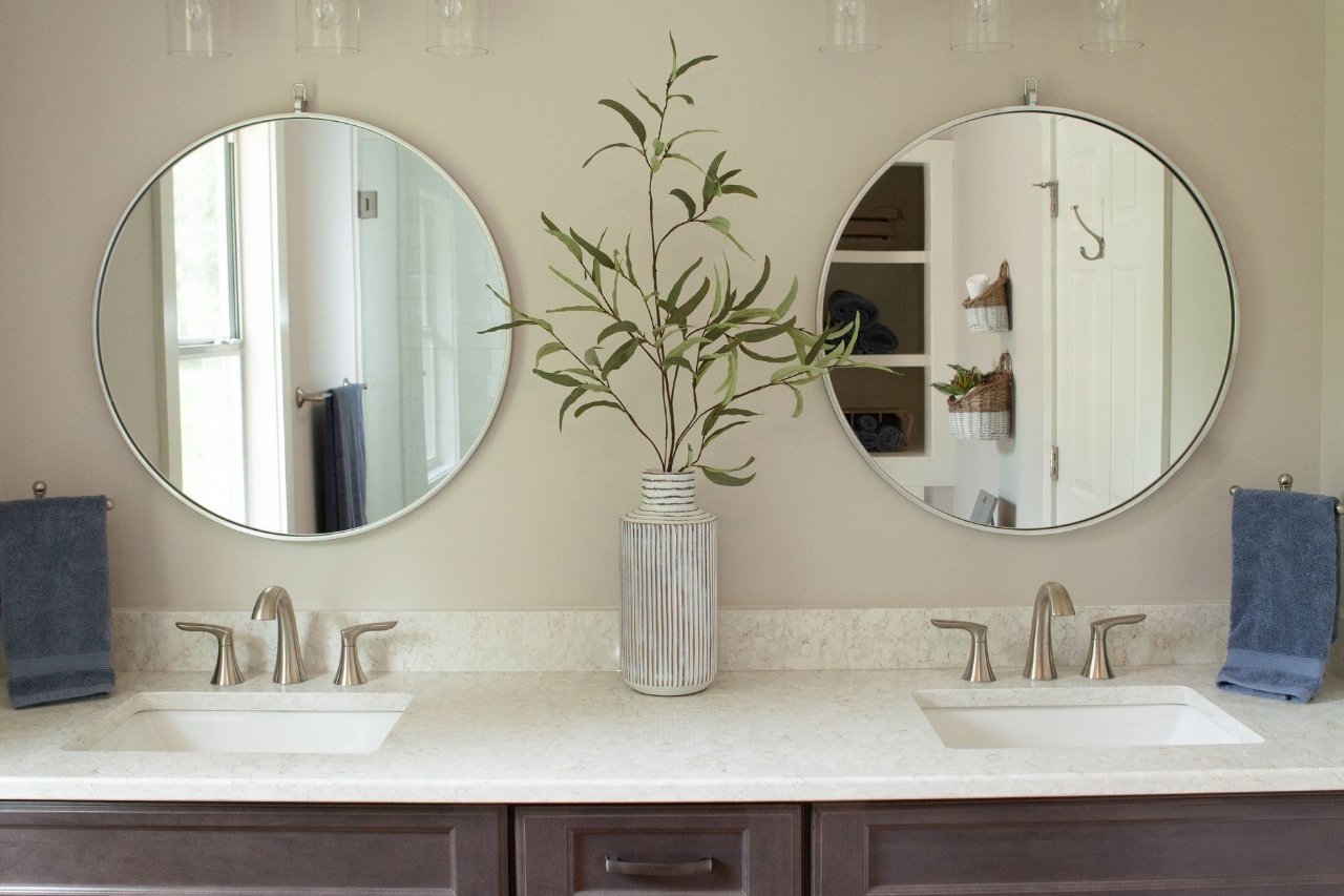 Primary Bathroom Featuring His and Hers Sinks in Lakefront Home Remodel | PAXISgroup Custom Home Builders in GA