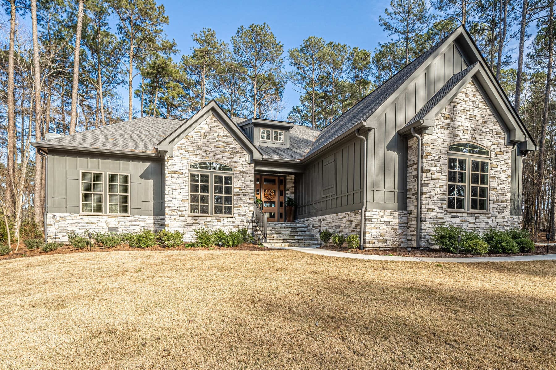 Gorgeous View of Front of House with Paneling and Stone Work |PAXISgroup
