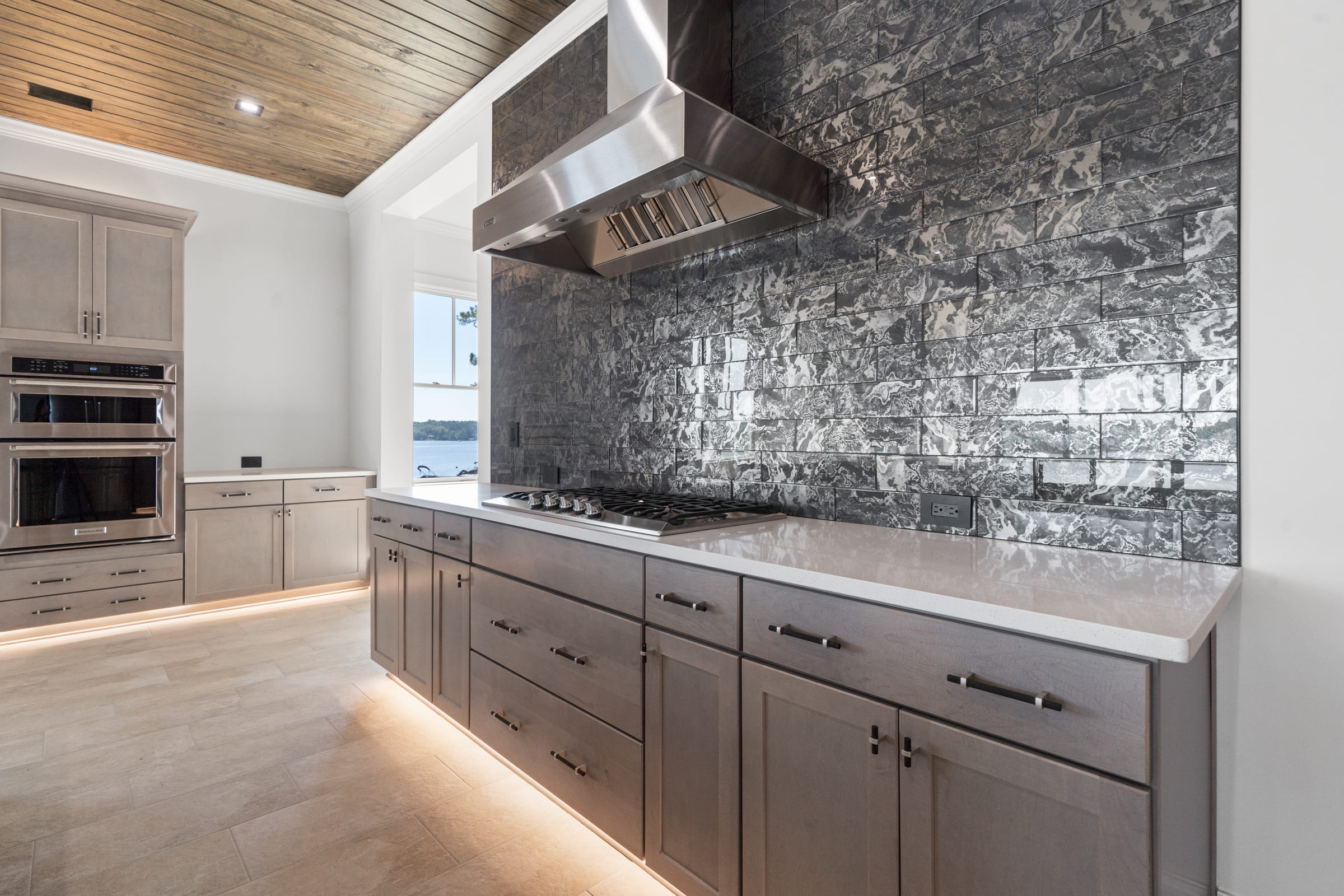 Close-up on Dark Stone Backsplash |PAXISgroup