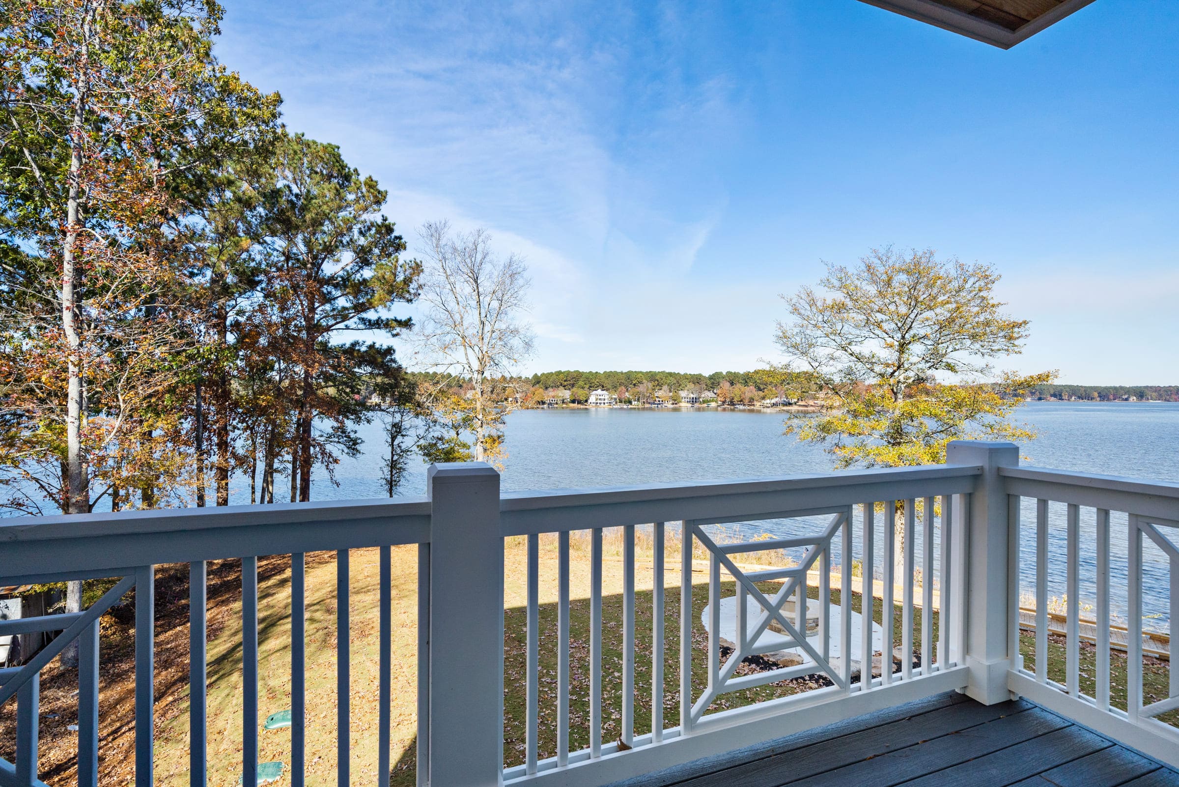 White Fence with Gorgeous Lake Front View  