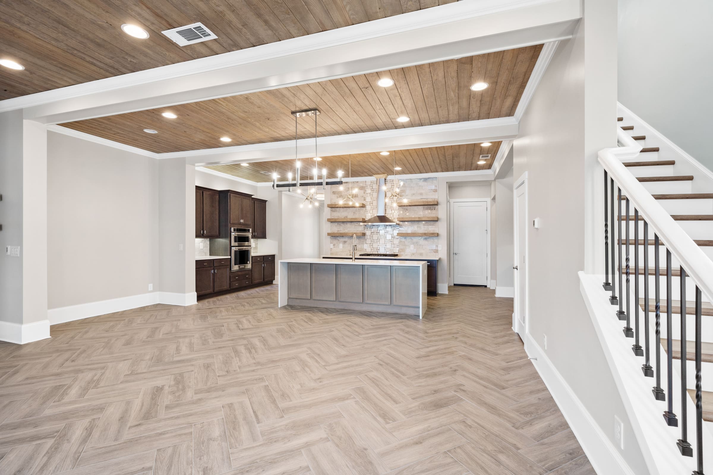 Beautiful Downstairs Kitchen and Bar Area. Detailed Hardwood Floor  