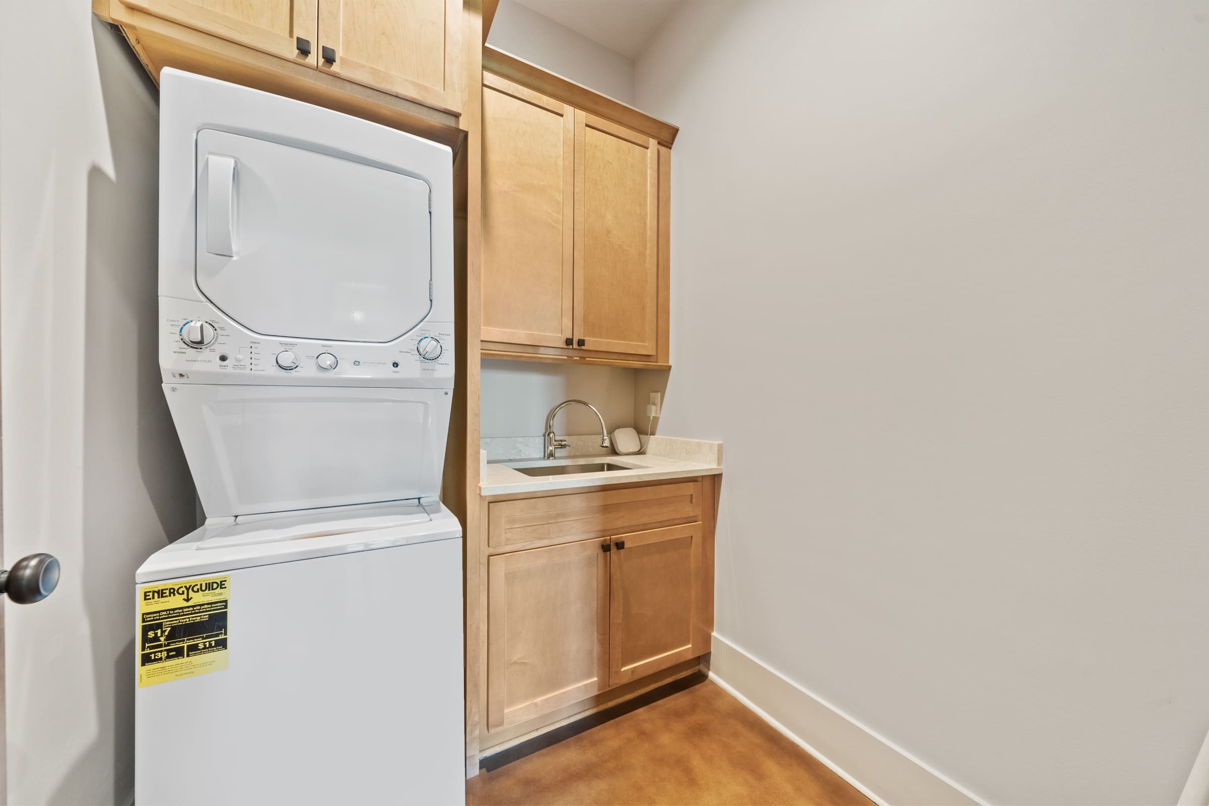 Laundry Room with Faucet and Storage | PAXISgroup