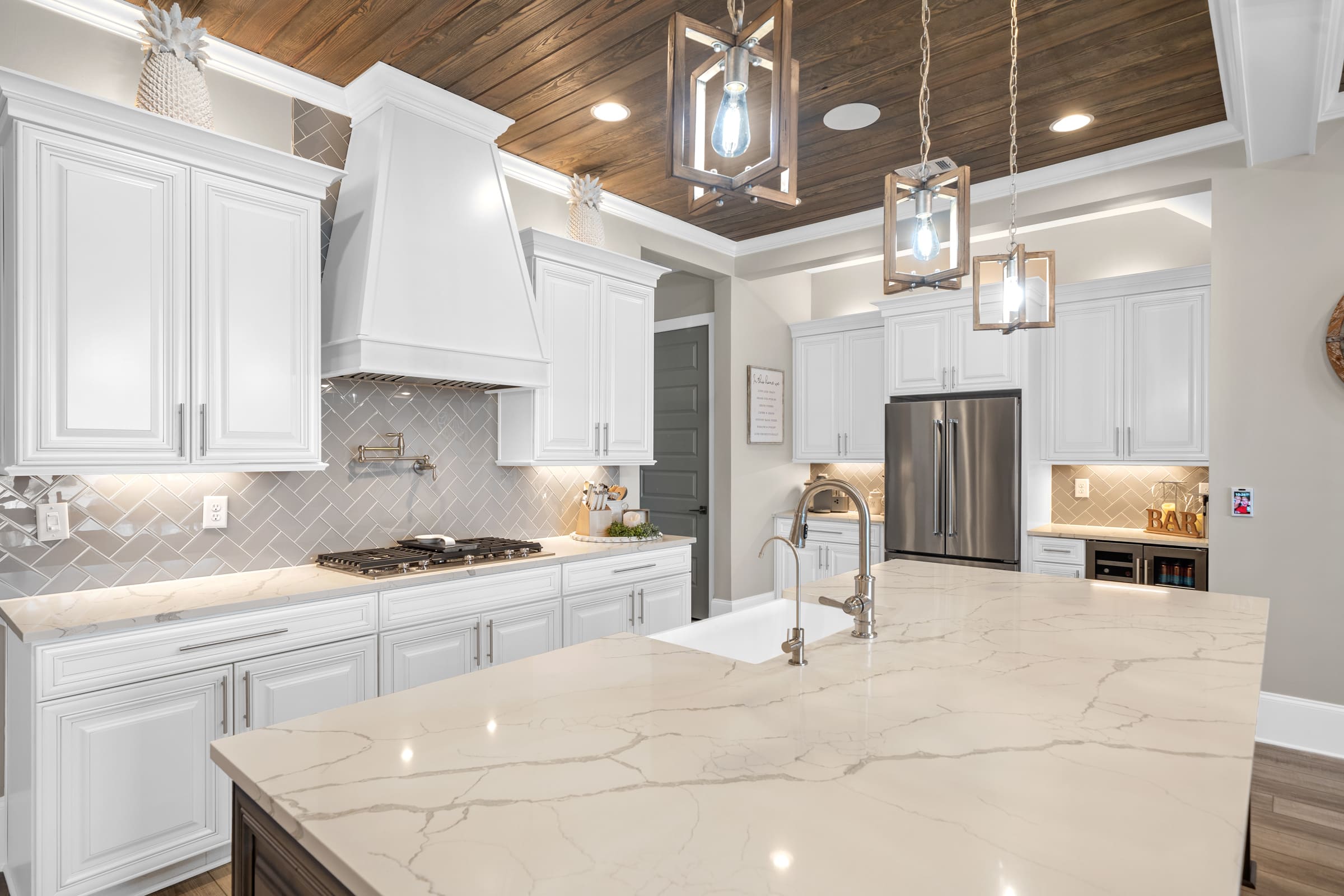 Beautiful Kitchen with Large White and Grey Kitchen Island |PAXISgroup