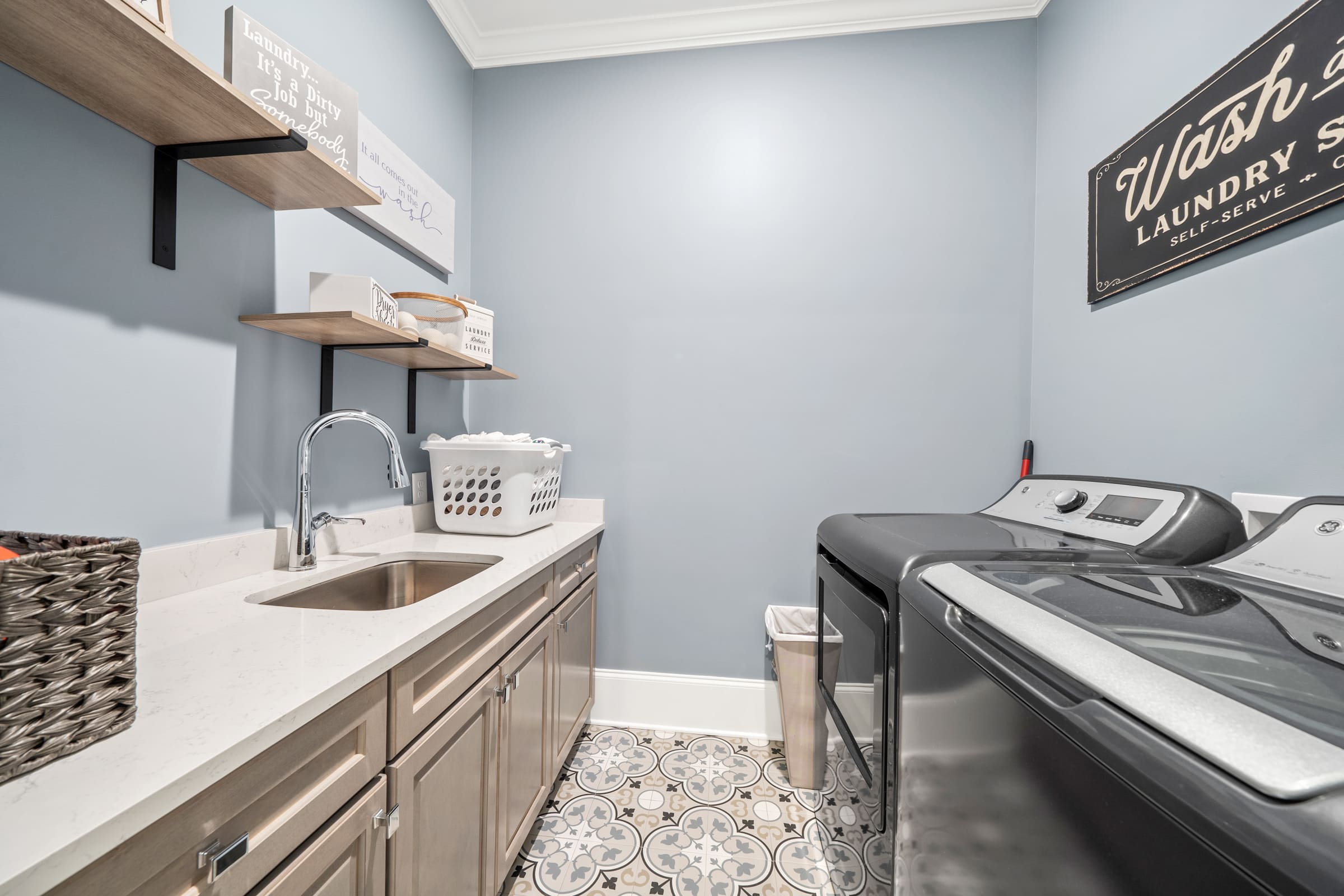 Laundry Room with Floating Shelves for Storage and Easily Accessible Sink |PAXISgroup Laundry Room with Floating Shelves for Storage and Easily Accessible Sink |PAXISgroup