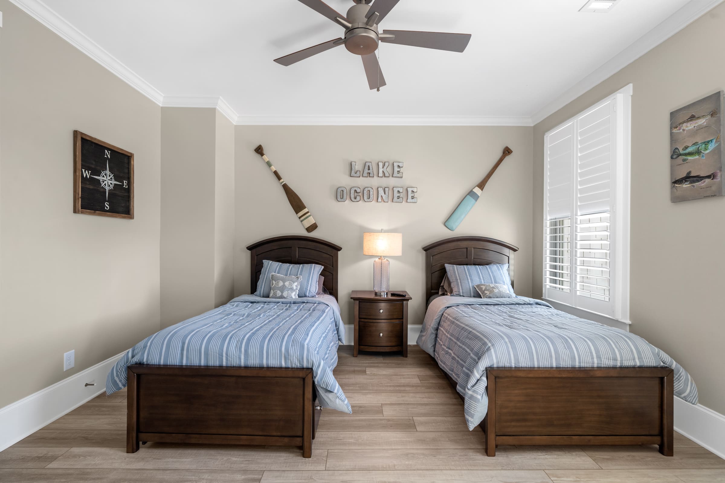Spacious Bedroom with Two Twin Beds Showcasing Lake Oconee |PAXISgroup