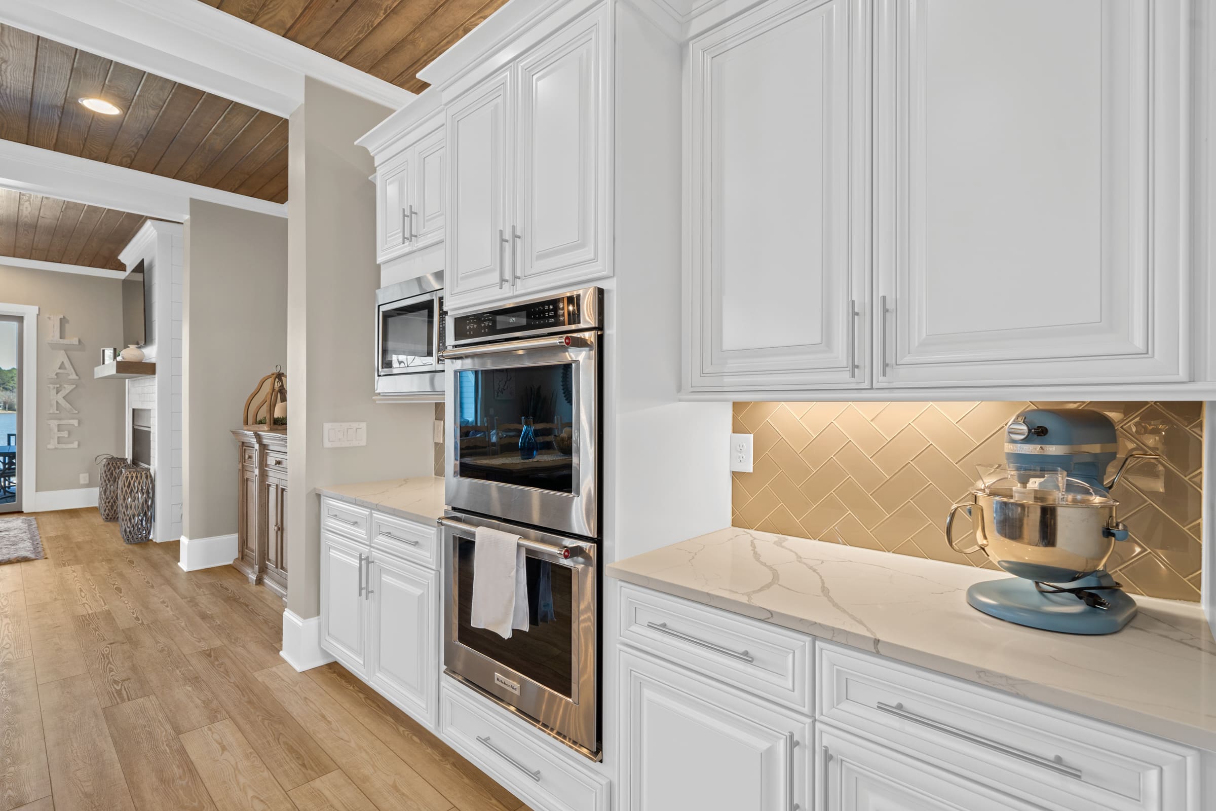 White Cabinetry and Kitchen View 