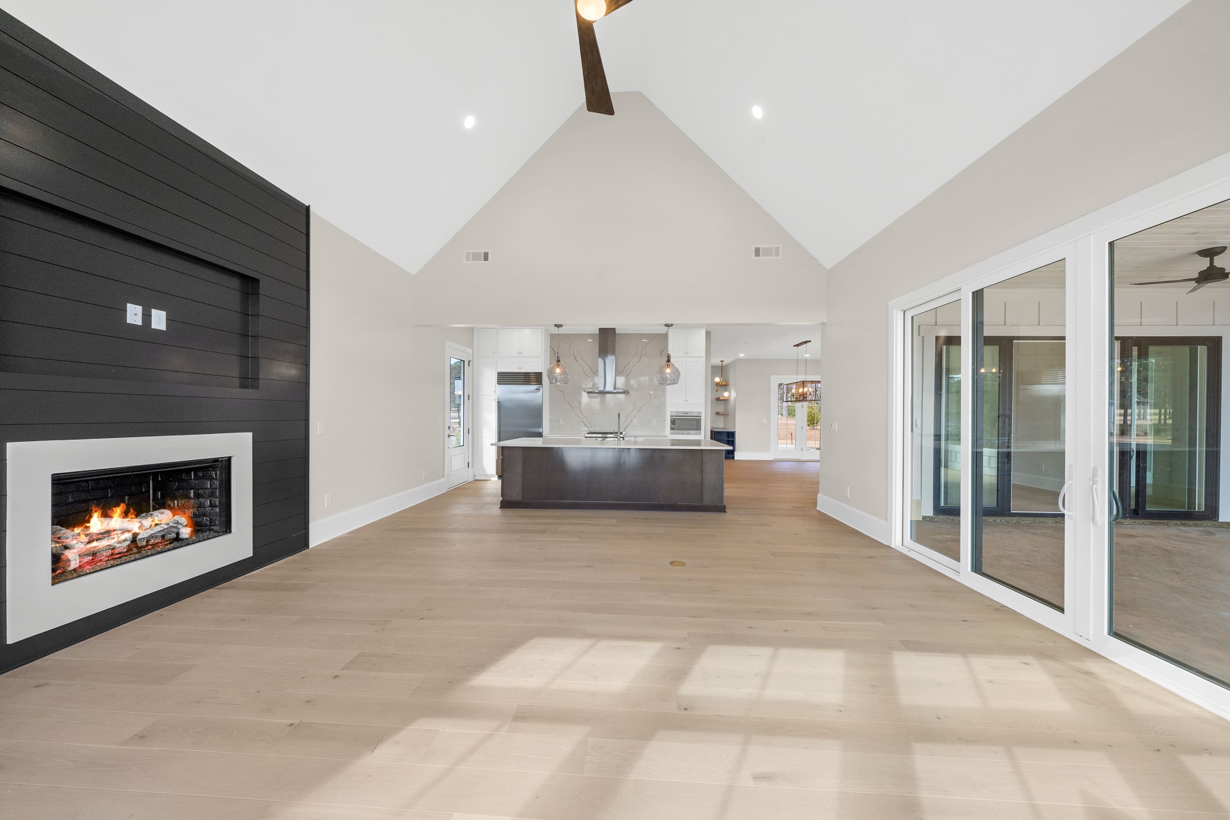 Full View of Kitchen and Living Area with Unique Triangular Ceiling |PAXISgroup Full View of Kitchen and Living Area with Unique Triangular Ceiling |PAXISgroup