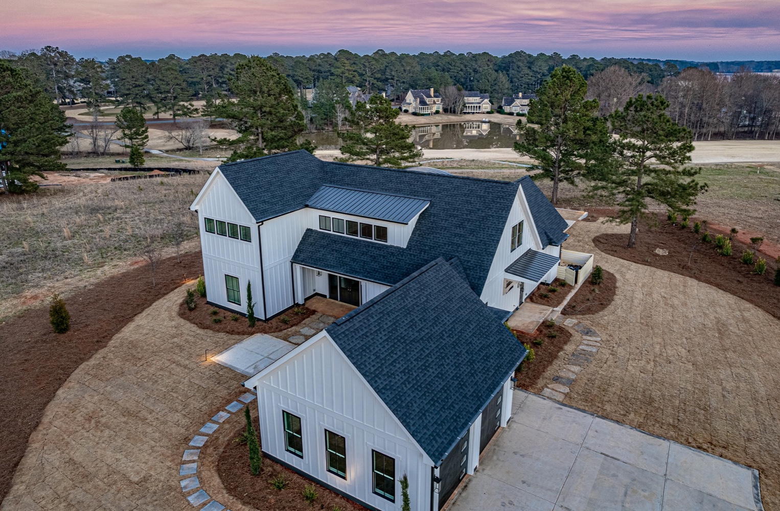 Farmhouse on the Fairway Beautiful Modern Farmhouse Against Georgia Sunset | PAXISgroup