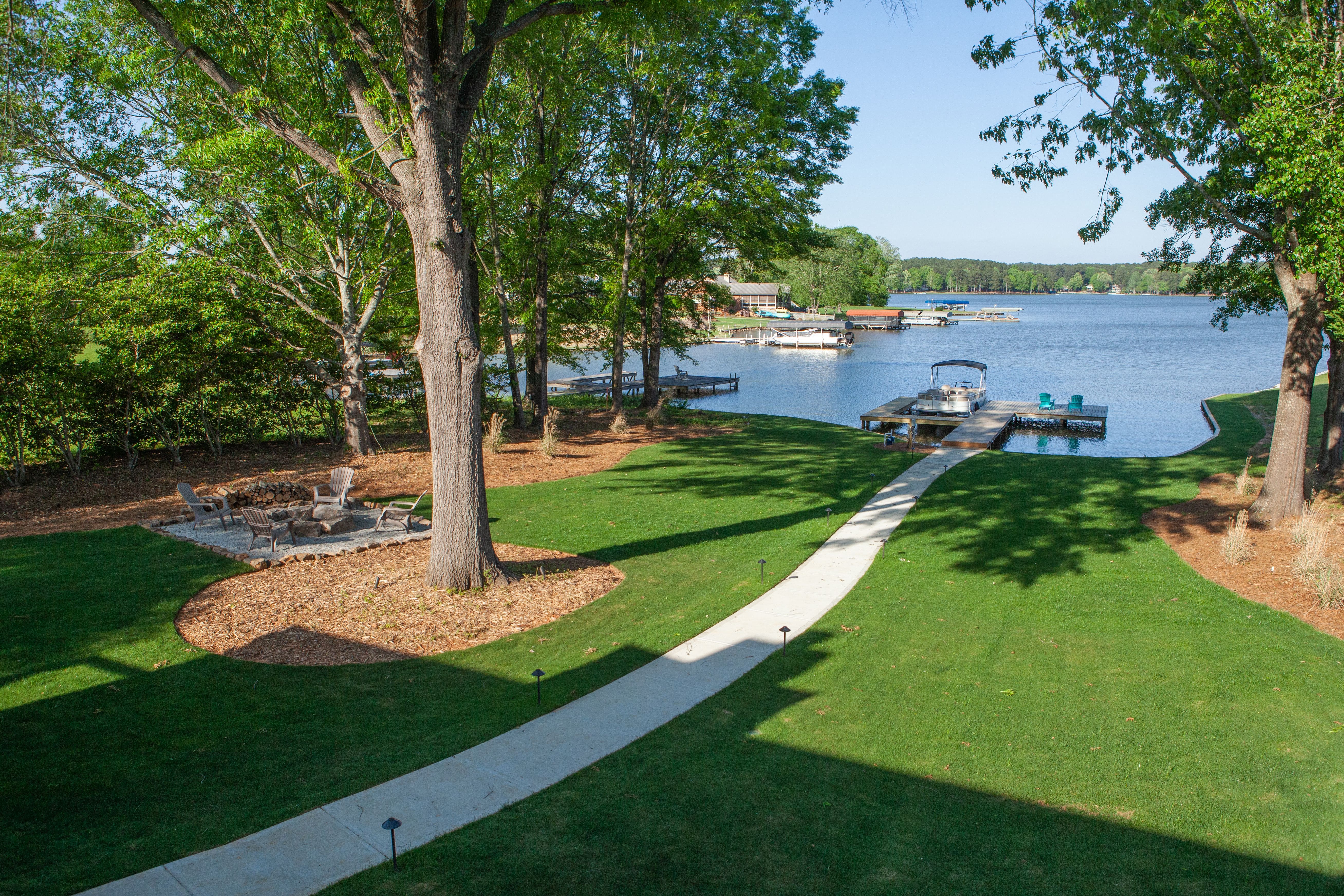 Backyard Walkway to Lake at Stunning Home Remodel on Lake Oconee GA | PAXISgroup Custom Home Builders in GA Backyard Walkway to Lake at Stunning Home Remodel on Lake Oconee GA | PAXISgroup Custom Home Builders in GA