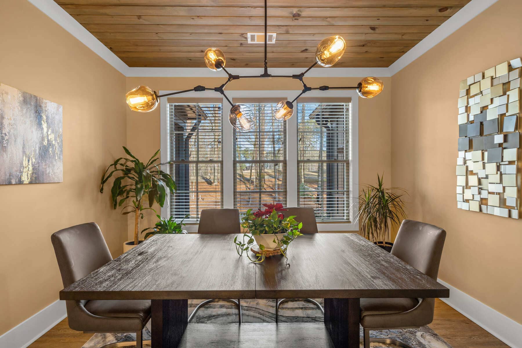 Dining Room with the Large Windowa and Beautiful Lighting