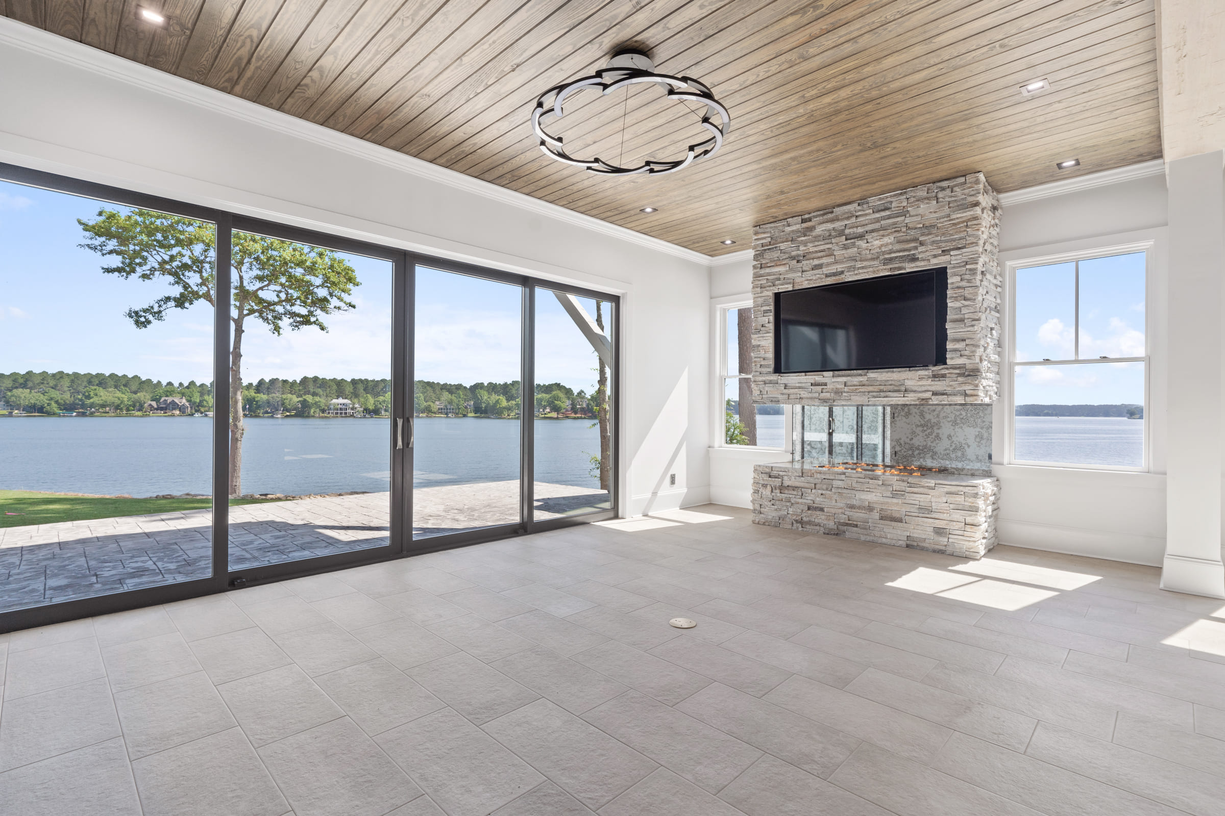 Living room with Stone Fireplace |PAXISgroup