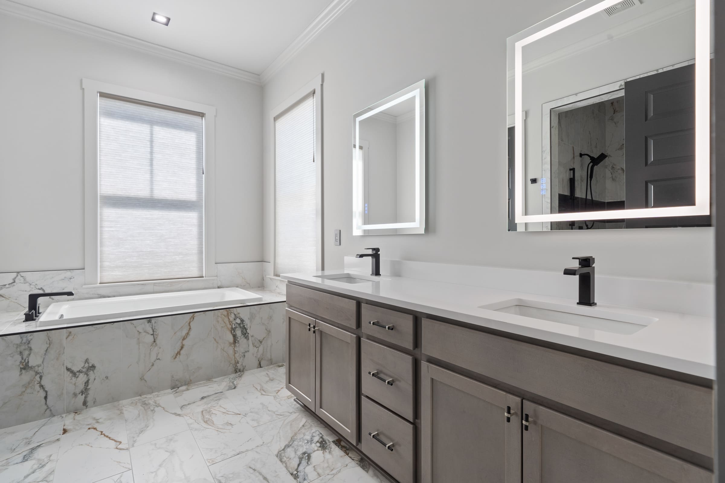 Master Bathroom with Stone Floor and Bathtub |PAXISgroup