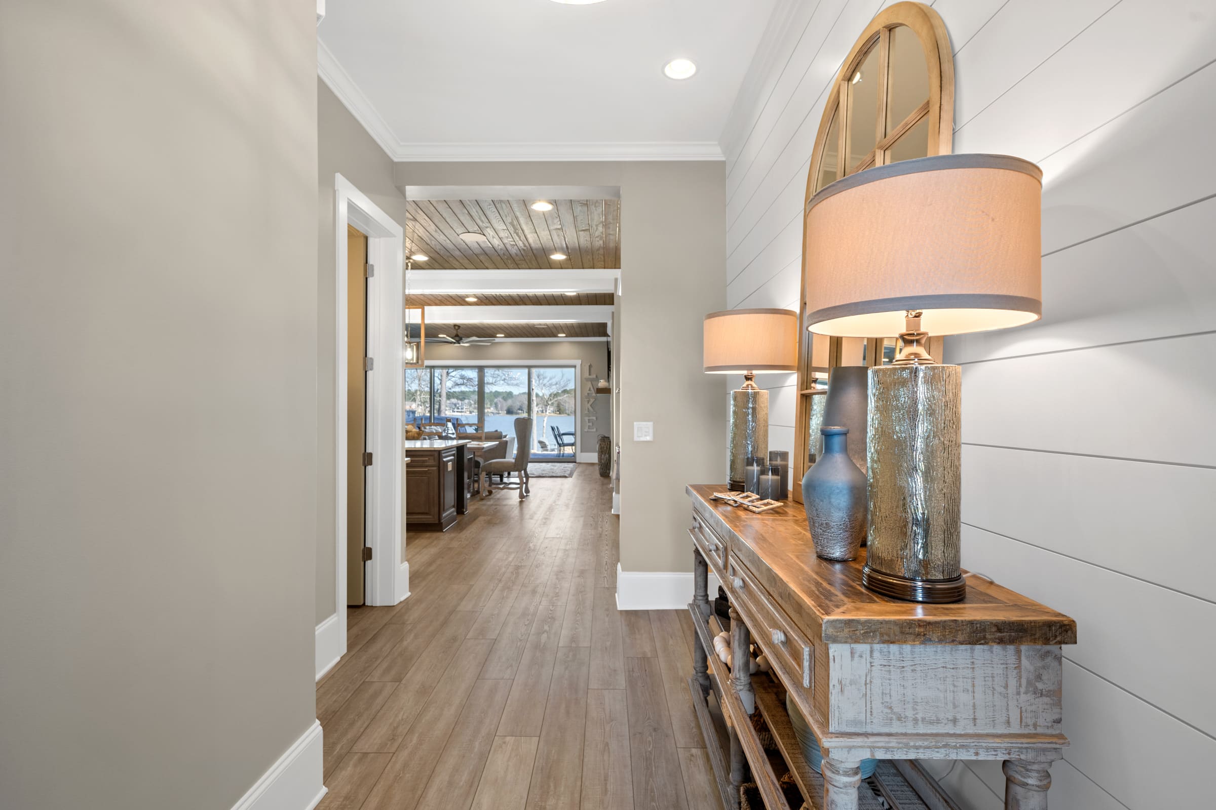 Beautiful Entryway with Pannel Walls and Wood Flooring |PAXISgroup