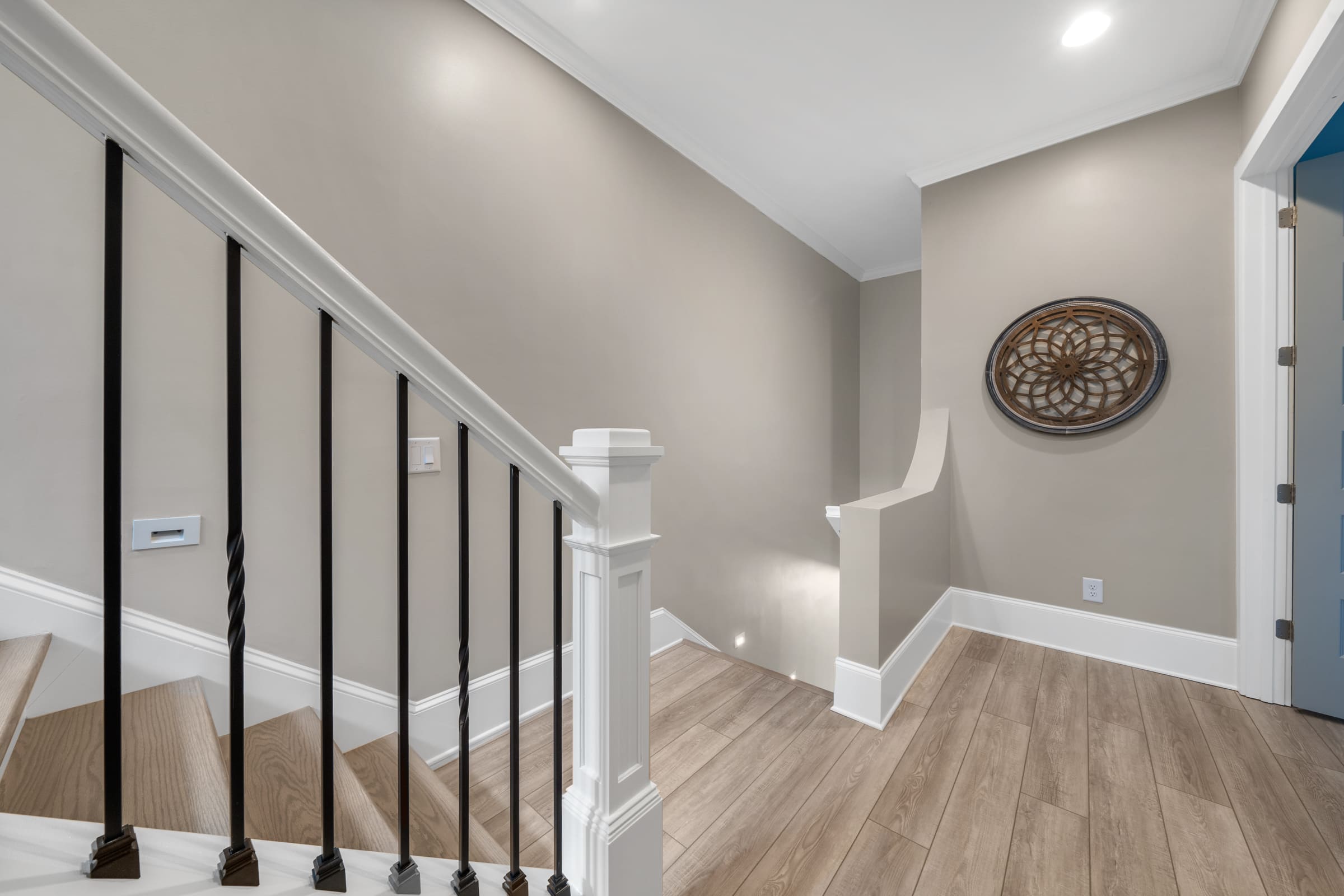 Light Wood Staircase with White Banister and Black Steal Rails |PAXISgroup