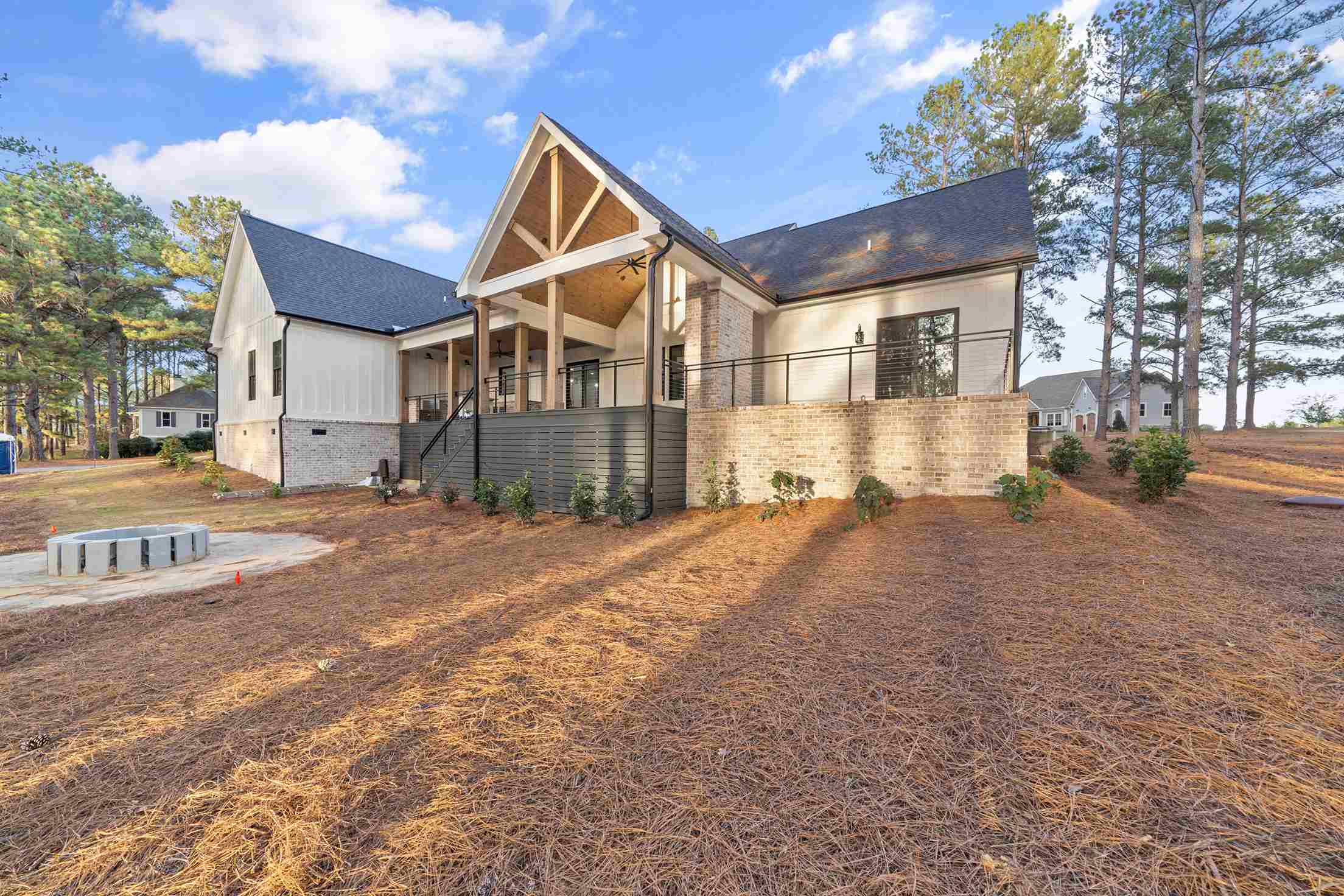 Paxis Indian Trail Custom home exterior of back patio | Paxisgroup Paxis Indian Trail Custom home exterior of back patio | Paxisgroup