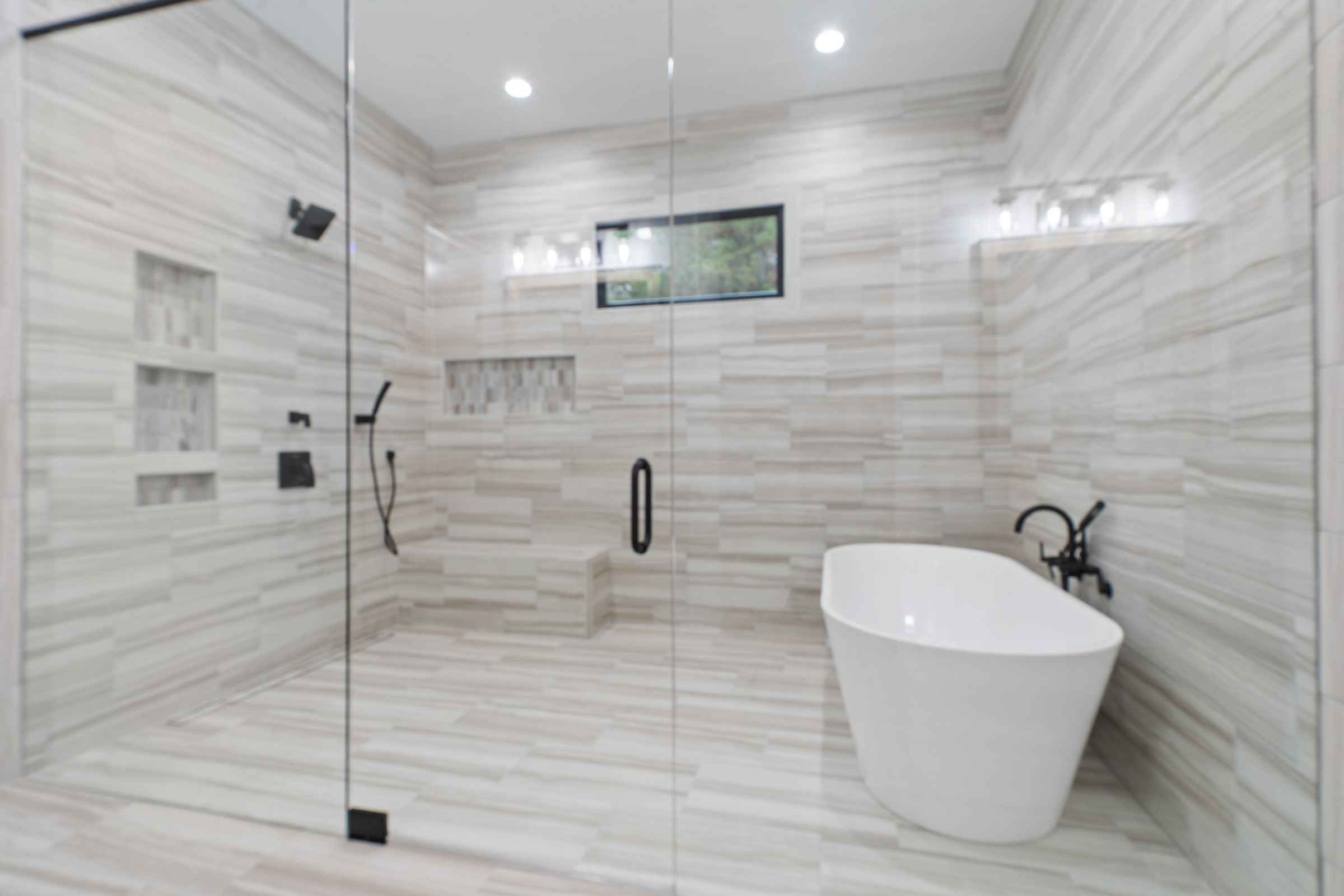 Paxis Indian Trail Master bathroom with walk-in spa shower area with standing tub | Paxisgroup